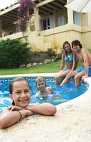 family in pool